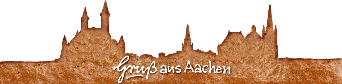 Die Aachener Silhouette aus Printenteig mit dem Schriftzug Gru&szlig; aus Aachen