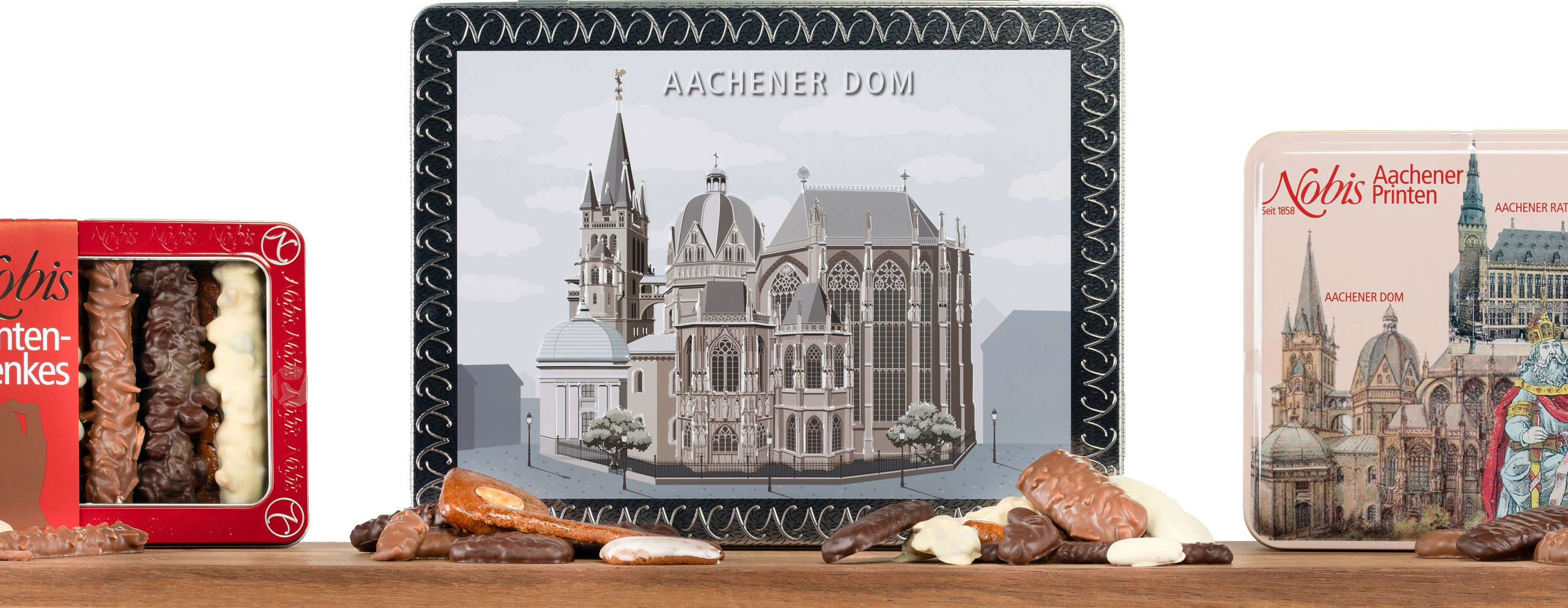 Geschenkdosen mit Aachener Motiven und Printen